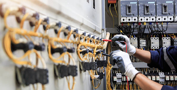 Professional Electrician technician working in Lenox, IA